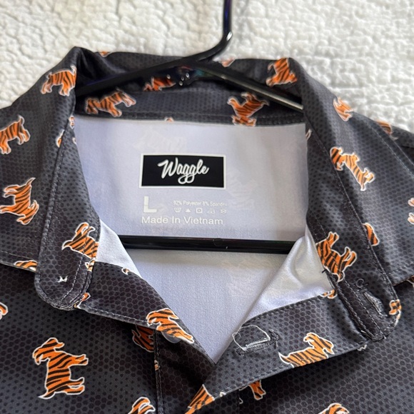 Stylish Black Polo with Orange Tiger Pattern - Picture 2 of 4
